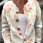 Lieke | Cardigan met roze bloemen en groene blaadjes