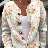 Lieke | Cardigan met roze bloemen en groene blaadjes